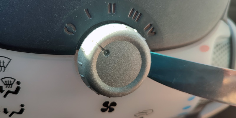 Déclipsage du sélecteur de vitesse de ventilation